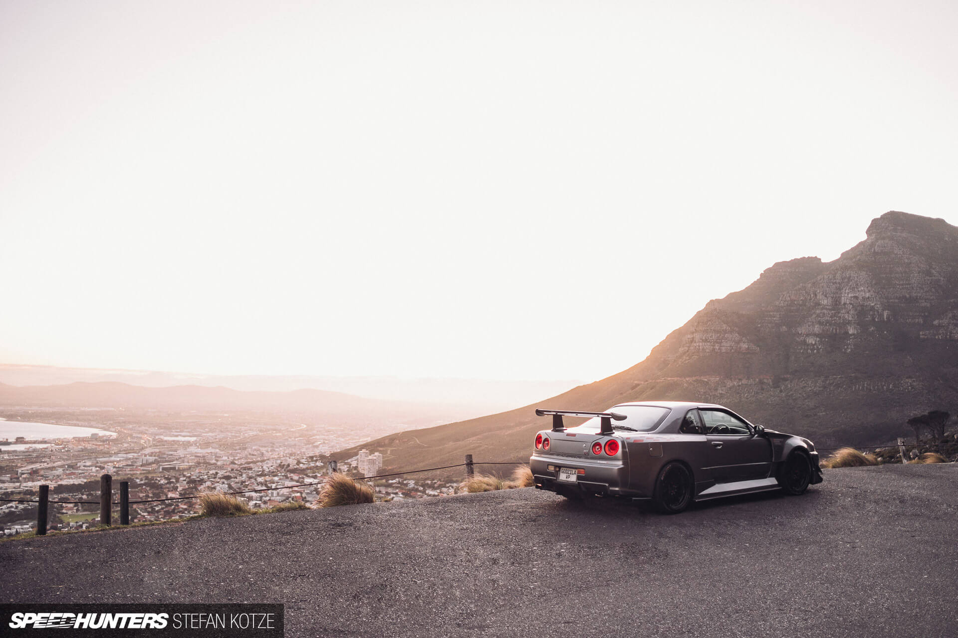 Nissan Skyline R34 GT-R in a city landscape